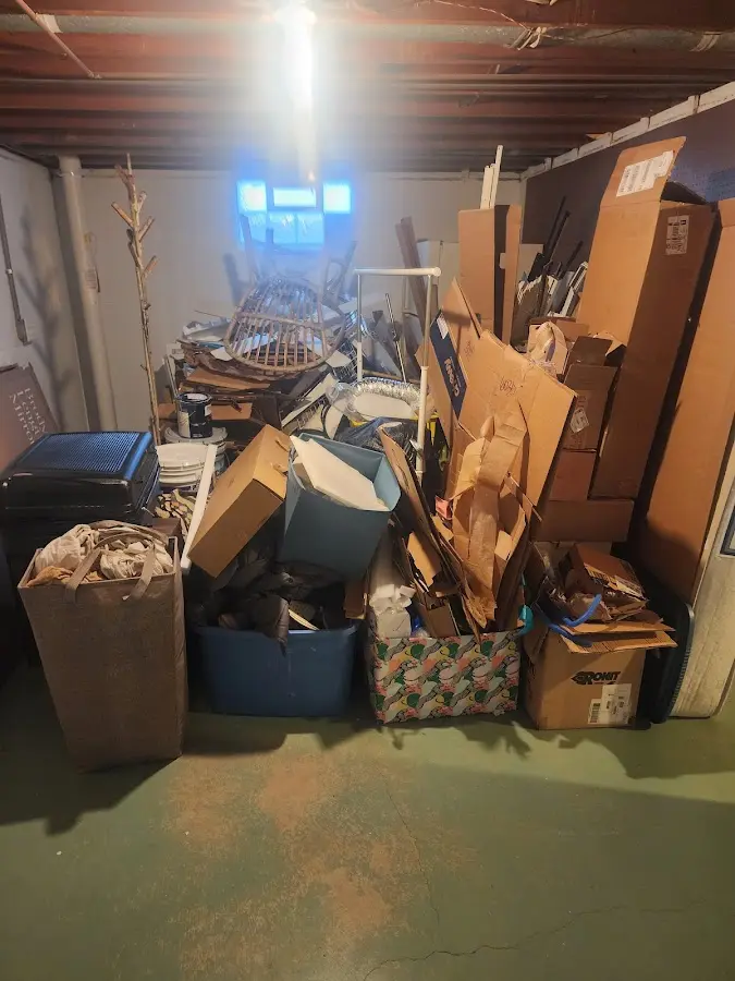 Roll-off dumpster container at job site for 2 Yard Dumpster Rental in Appleton